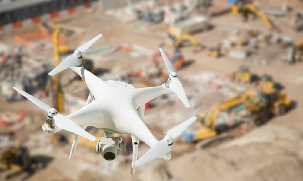 Drones surveying a construction site in San Diego to capture aerial data for land development projects