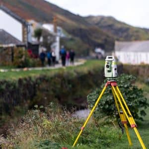 Flood elevation survey performed by a licensed land surveyor using precision field equipment

