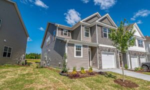 Modern infill homes built close together where boundary line surveys help clarify property limits
